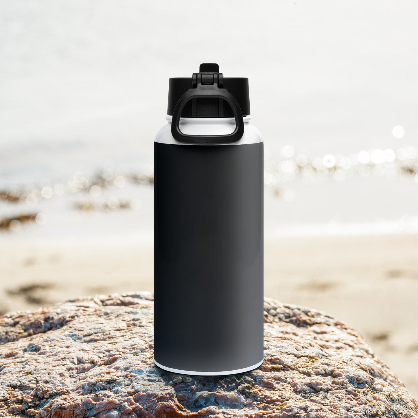 Stainless steel water bottle with a straw lid